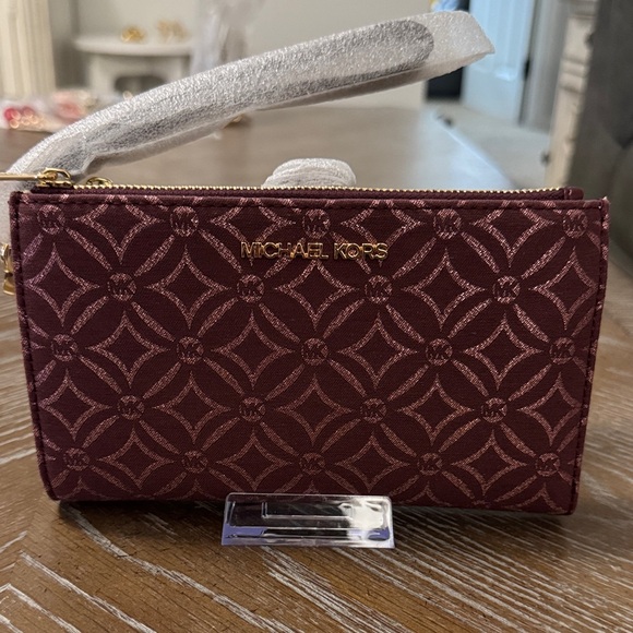 Michael Kors Handbags - Michael Kors Maroon Patterned Wallet/ Wristlet